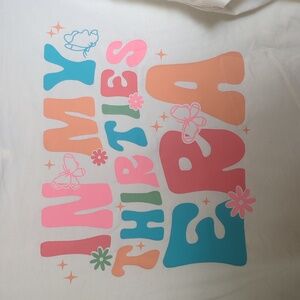 Cream Graphic T-Shirt with 30 Era Design